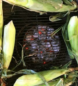 The homemade charcoal halo can create singe-free zones in any circular grill or smoker. It's great for grilling corn or other veggies.