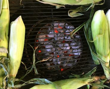The homemade charcoal halo can create singe-free zones in any circular grill or smoker. It's great for grilling corn or other veggies.