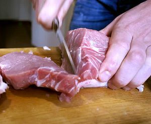 Cut up a whole pork loin