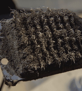 Wire-bristle brushes could cause health issues due to metal being ingested after grilling.