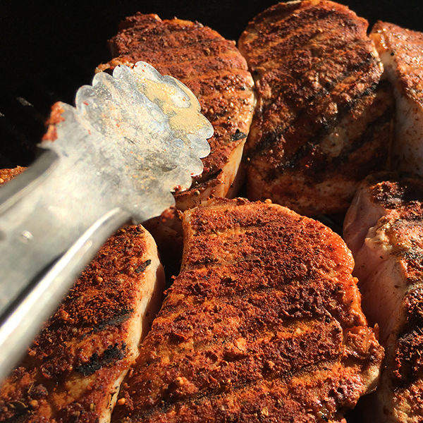 Move the chops to the cool side of the grill, making sure to bunch the chops together.