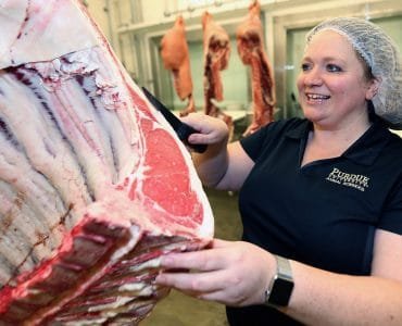 Stacy Zuelly, an assistant professor of animal sciences at Purdue University, runs a BBQ boot camp. She says people often overlook the importance of selecting and preparing the meat. (Purdue Agricultural Communication photo/Tom Campbell)