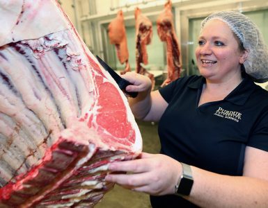 Stacy Zuelly, an assistant professor of animal sciences at Purdue University, runs a BBQ boot camp. She says people often overlook the importance of selecting and preparing the meat. (Purdue Agricultural Communication photo/Tom Campbell)