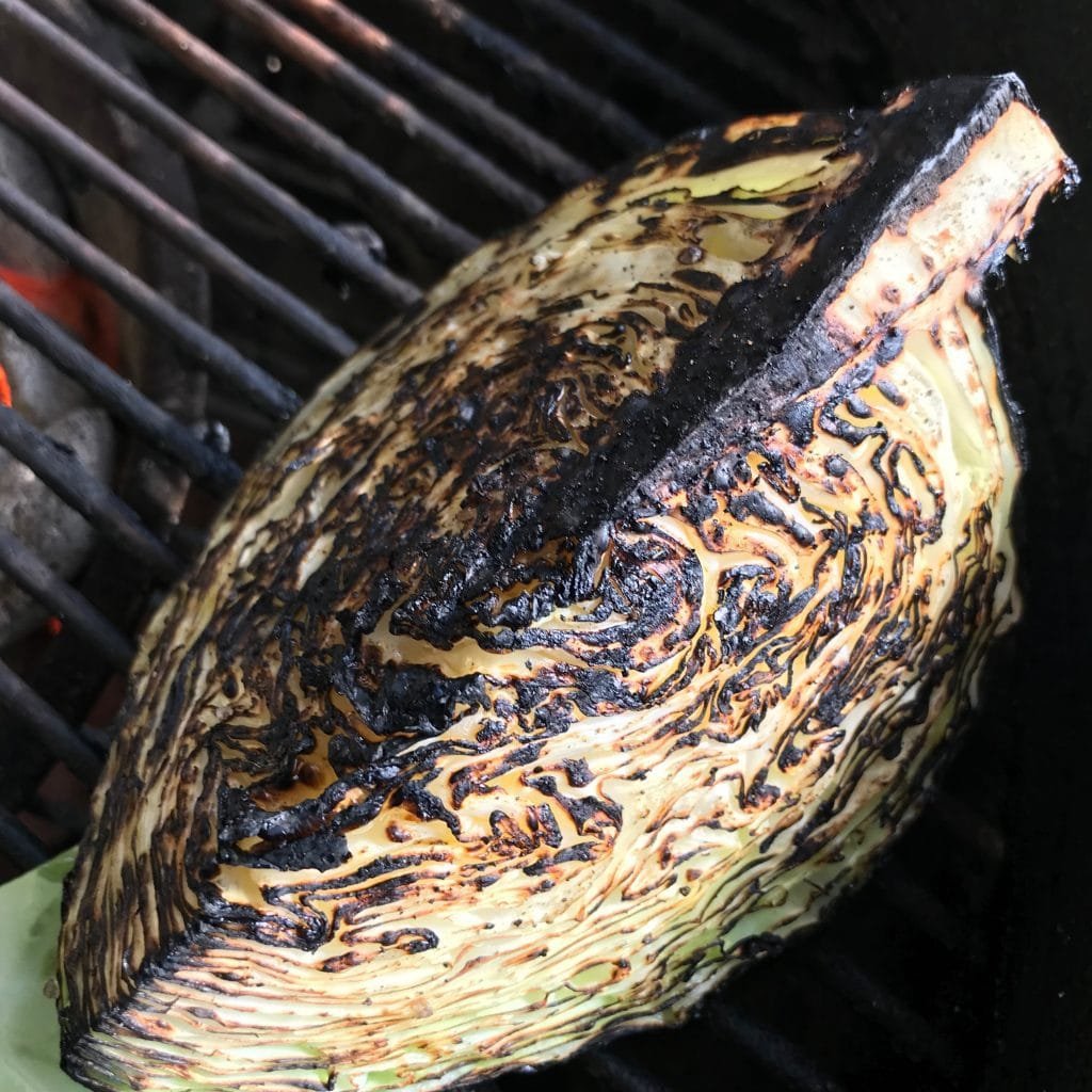 Grilled cabbage is a perfect clean-food addition to your healthy daily intake. Add olive oil and salt-free seasonings while on the heat for a tender, flavorful main or side off the grill.