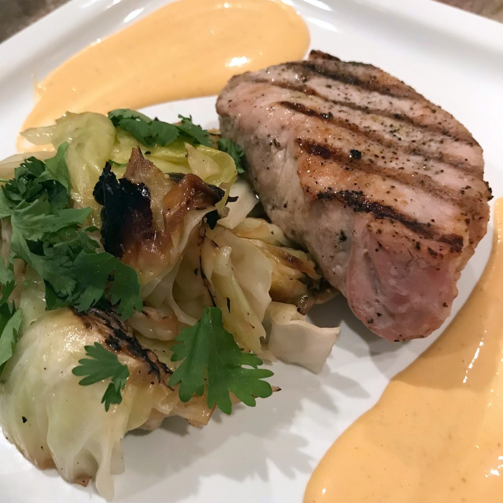 Paired with a medium-rare pork chop, the warm, tender grilled cabbage is quite the tasty, healthy meal off the grill.