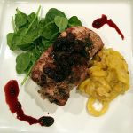 Place a chop in the center of the plate and top with Balsamic Blackberry Compote. This dish goes great with summer greens and stewed squash.