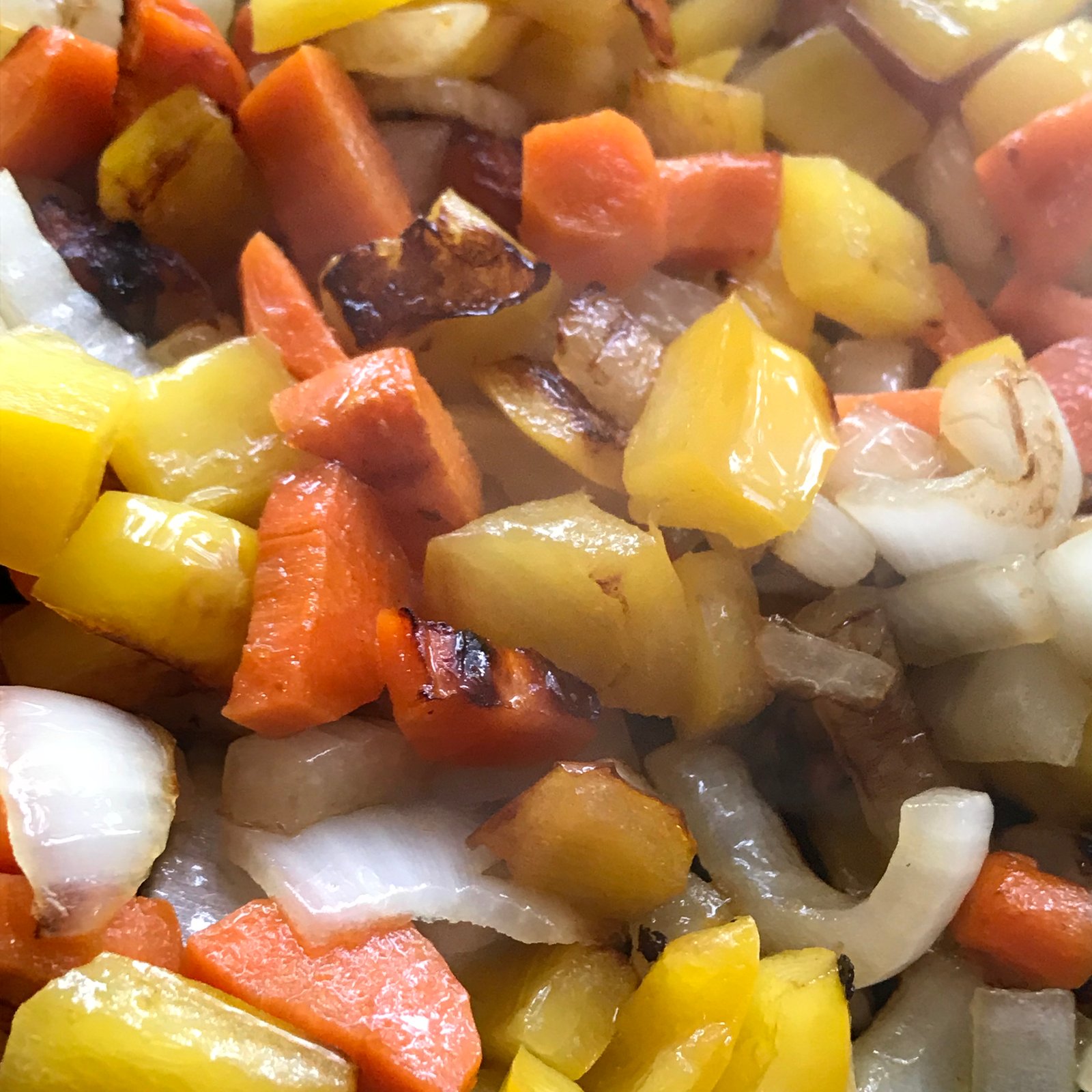 Whole30-compliant vegetables seared in a FireDisc Shallow 24 for fried rice.