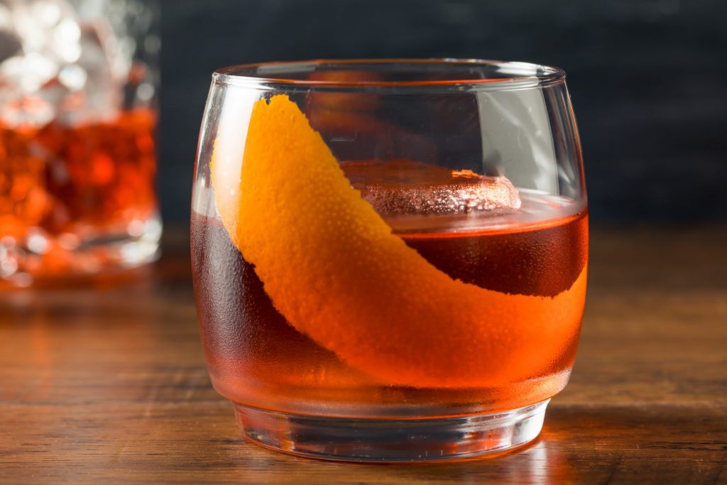Alcoholic Red Negroni Cocktail with Vermouth Gin and Oranges